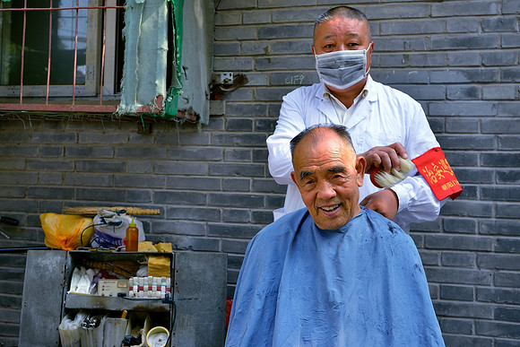 Traditional street barber Beijing